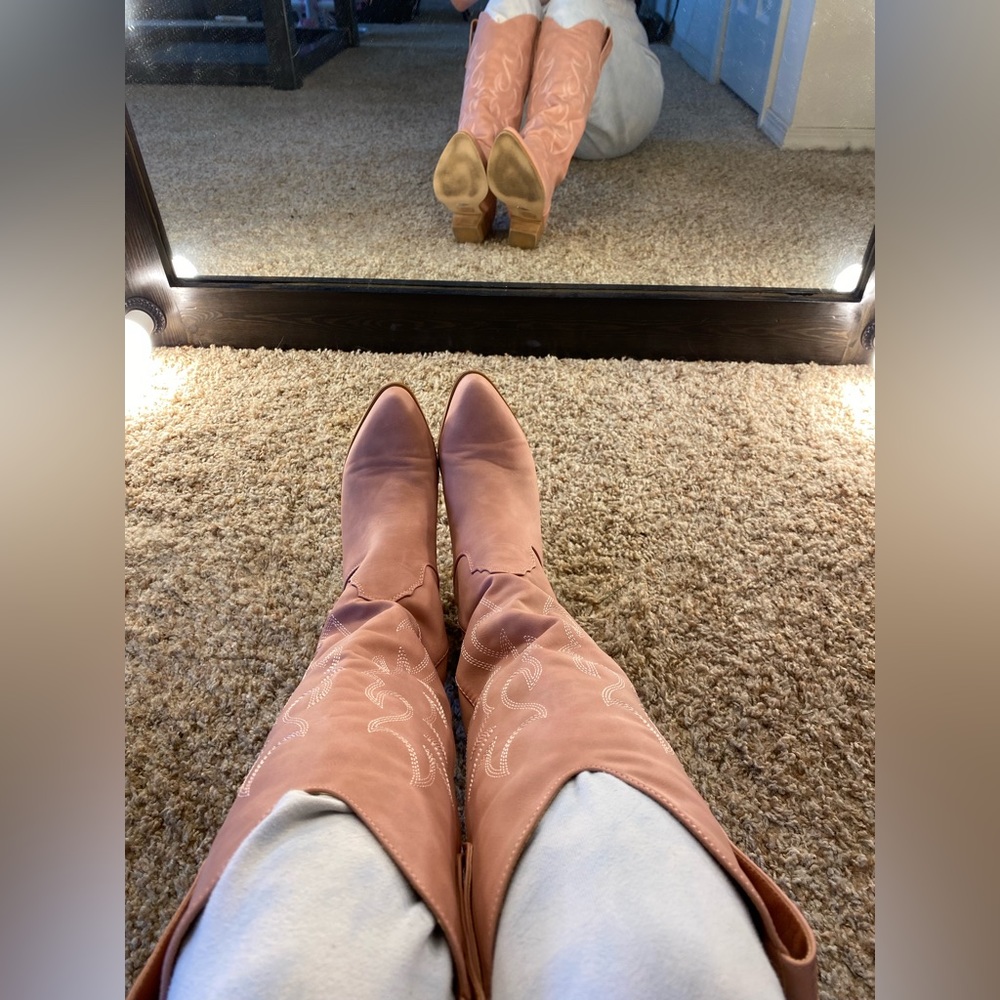 Pink knee high boots